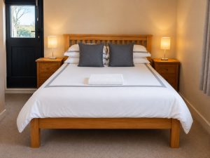 willow lodge upstairs double and 2 singles bedroom